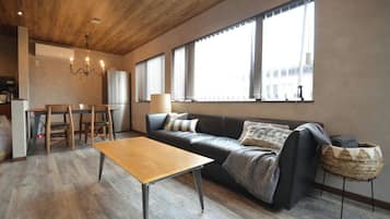 Apartment, 3 Bedrooms | Living area | Flat-screen TV