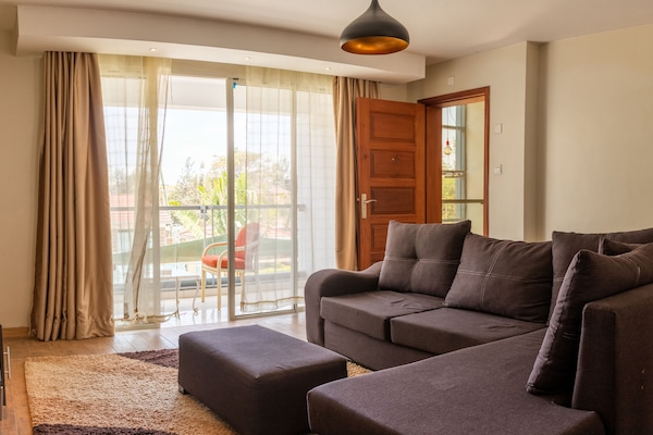 Executive Apartment, 1 Bedroom | Living area | Flat-screen TV