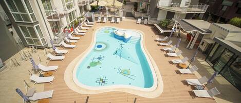 Outdoor pool, open 10:00 AM to 7:00 PM, pool umbrellas, sun loungers