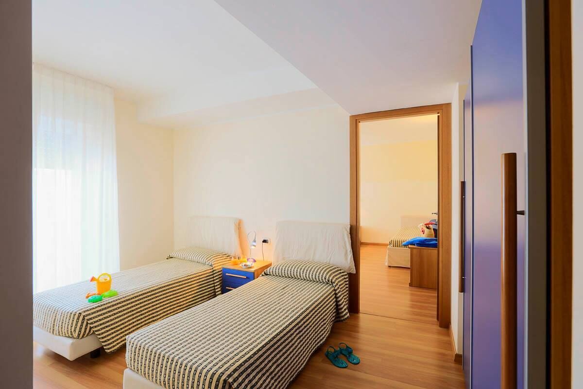 Family Room, Sea View (Deluxe Family Room) | Minibar, in-room safe, desk, blackout drapes