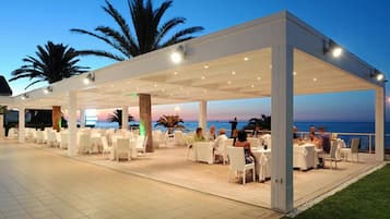 Breakfast, lunch, dinner served; local cuisine, pool views