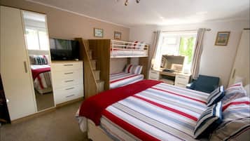 Family Quadruple Room | Hypo-allergenic bedding, laptop workspace, blackout drapes, free WiFi