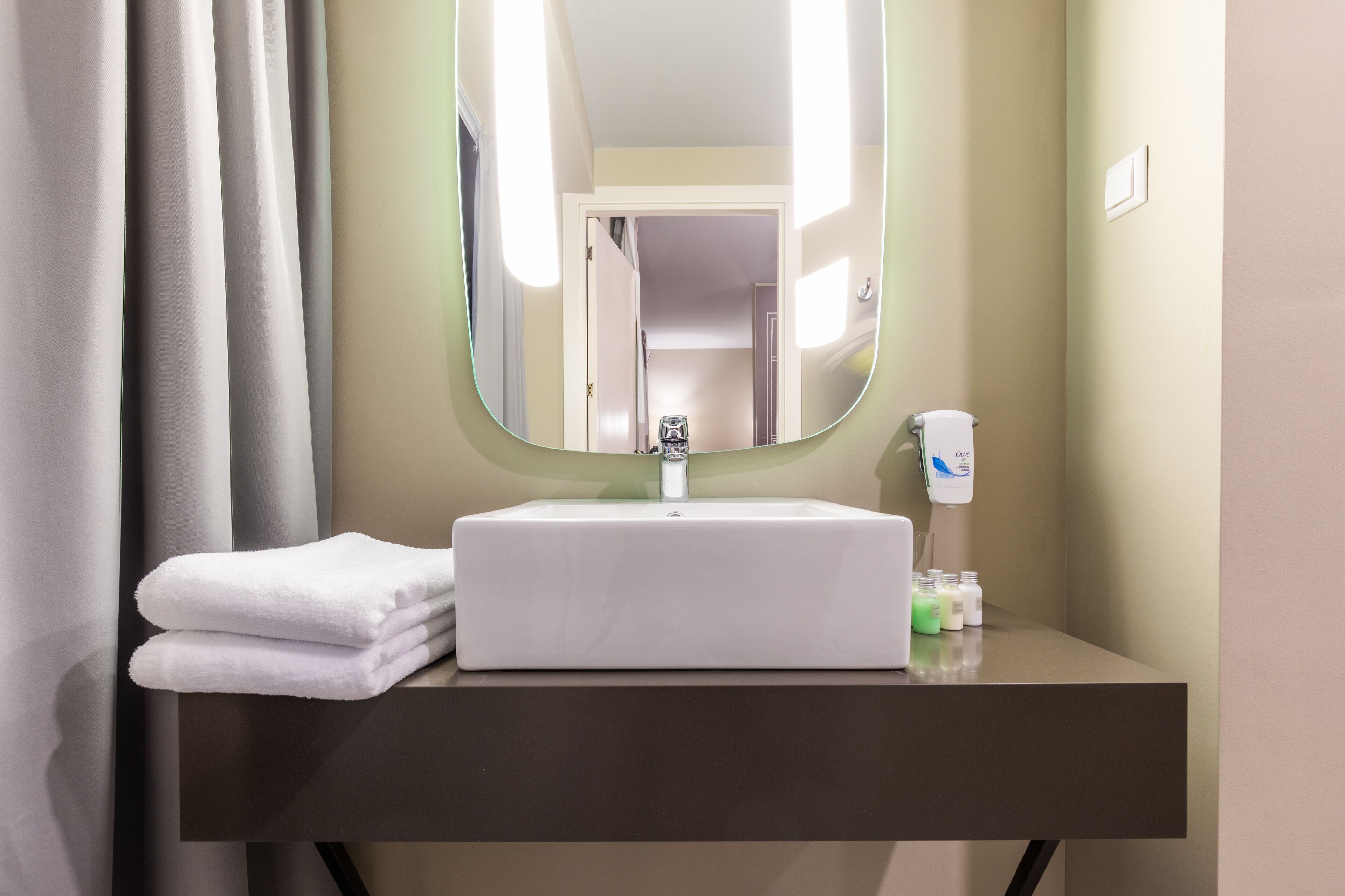 shower, eco-friendly toiletries, hair dryer, slippers