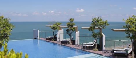 Outdoor pool, open 6:30 AM to 6:00 PM, pool umbrellas, sun loungers