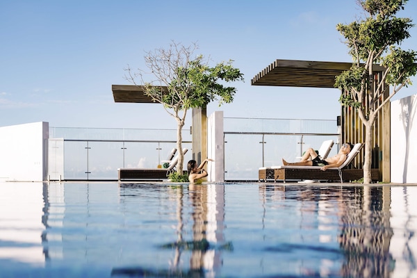 Outdoor pool, open 6:30 AM to 6:00 PM, pool umbrellas, sun loungers