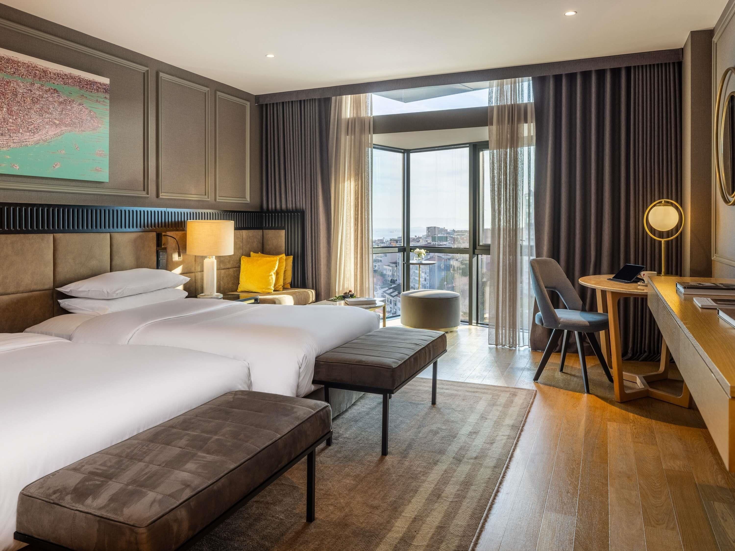 Luxury Room (Bosphorus View) | Minibar, in-room safe, desk, laptop workspace
