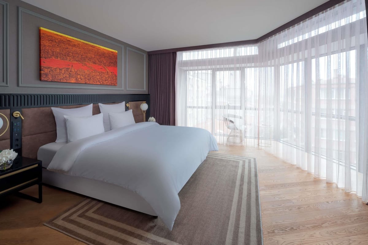 Junior Suite, 1 King Bed (Club Millesime Access) | Minibar, in-room safe, desk, laptop workspace