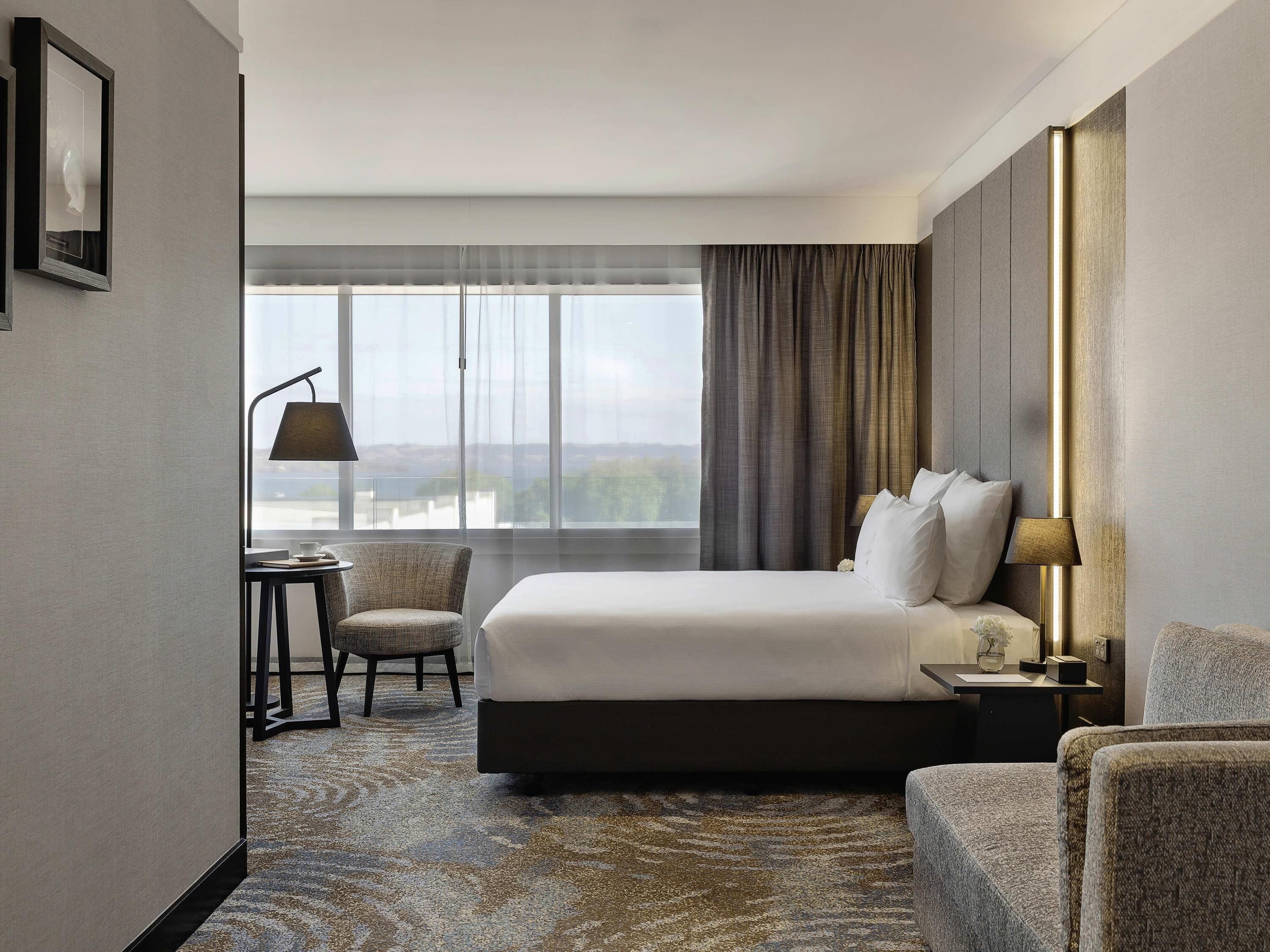 Premium bedding, down comforters, minibar, in-room safe