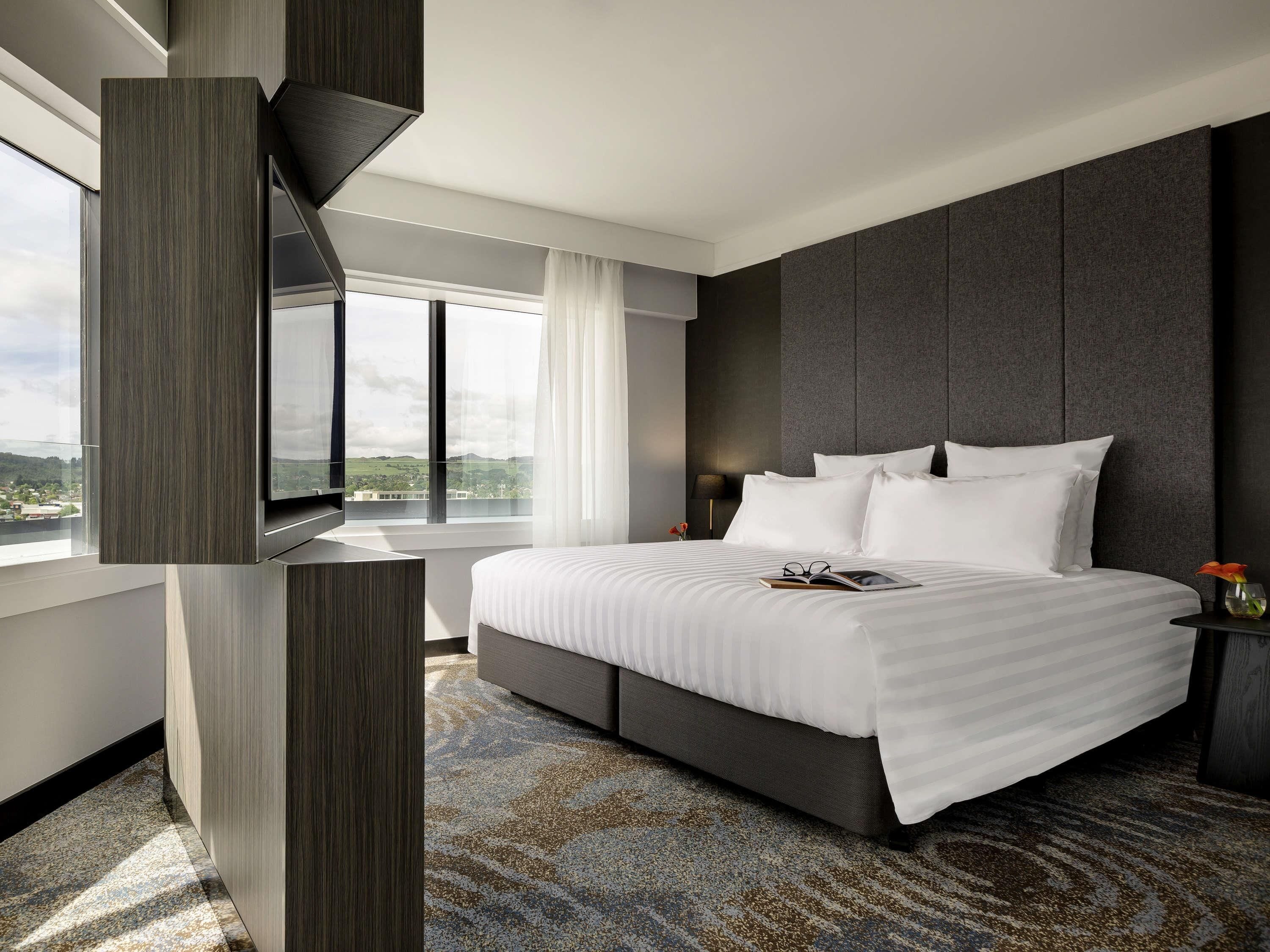 Premium bedding, down comforters, minibar, in-room safe