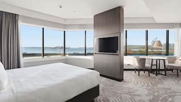 Premium bedding, down comforters, minibar, in-room safe