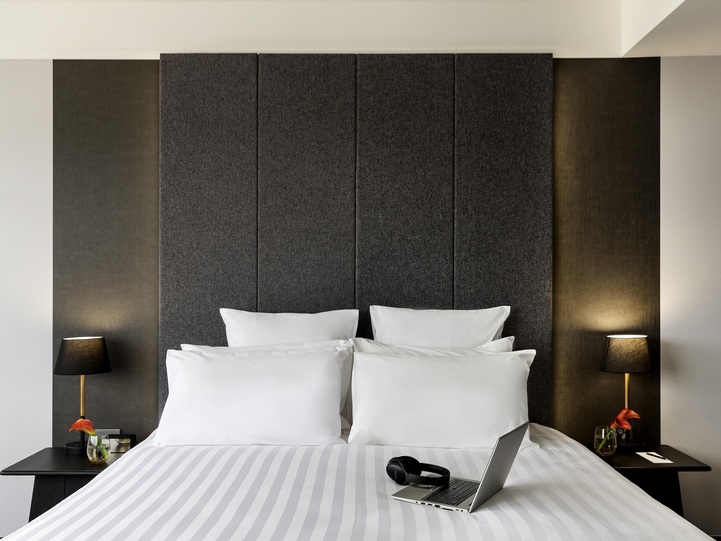 Premium bedding, down comforters, minibar, in-room safe