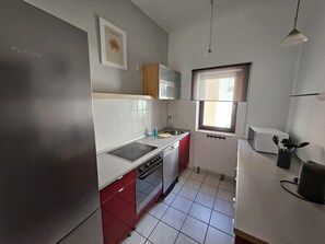 Shared kitchen - Bed4you Gästehaus 1 (Fuldabruck)