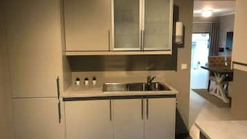 Apartment | Private kitchen | Full-size fridge, microwave, oven, stovetop