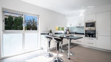 Apartment, 2 Bedrooms, Balcony, Sea View | Private kitchen | Coffee/tea maker, full-sized fridge, microwave, oven