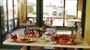 Daily buffet breakfast (USD 10 per person)