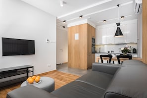Departamento Deluxe (Lubicz - 57) | Cocina privada | Refrigerador, microondas, parrilla de estufa y cafetera y tetera 