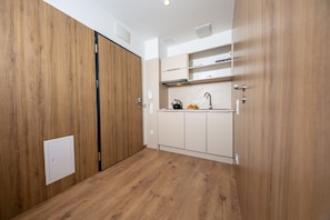Studio, Accessible | Private kitchen | Stovetop, coffee/tea maker, electric kettle, cookware/dishes/utensils - Micro Apartments Kazou Residence (Warsaw)