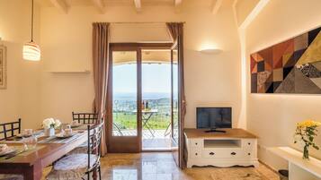 Appartement Panoramique | Coin séjour | Télévision à écran plat