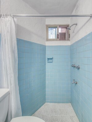 Shower, towels, soap, shampoo