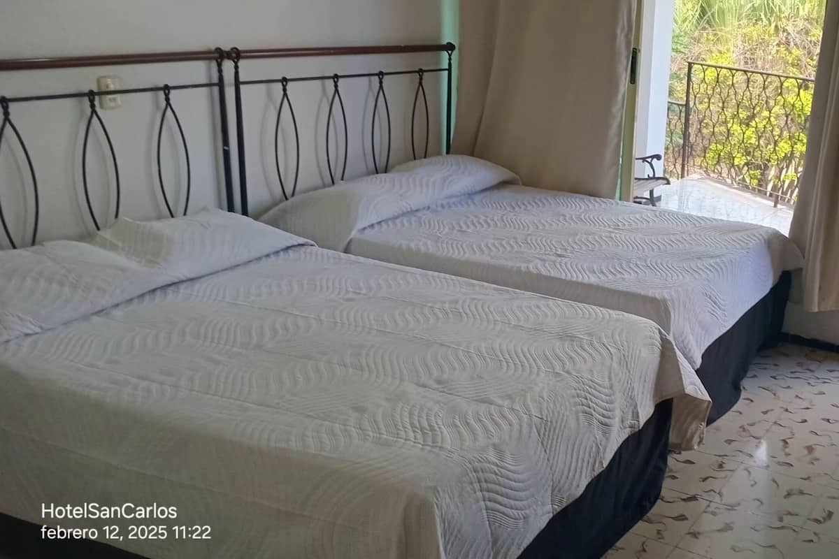 Down comforters, desk, free WiFi, bed sheets