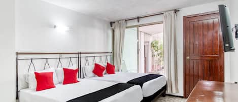 Desk, free WiFi, bed sheets