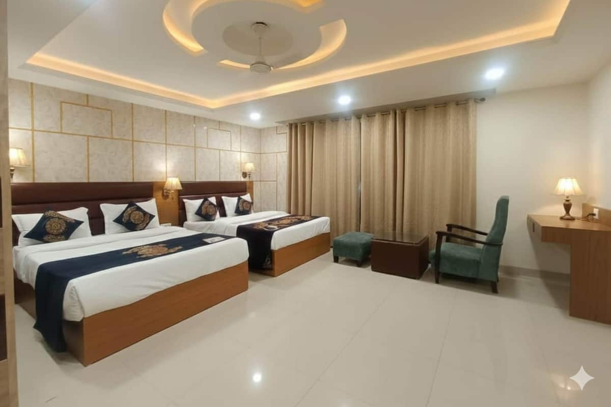 Escritorio, sistema de insonorización y tabla de planchar con plancha