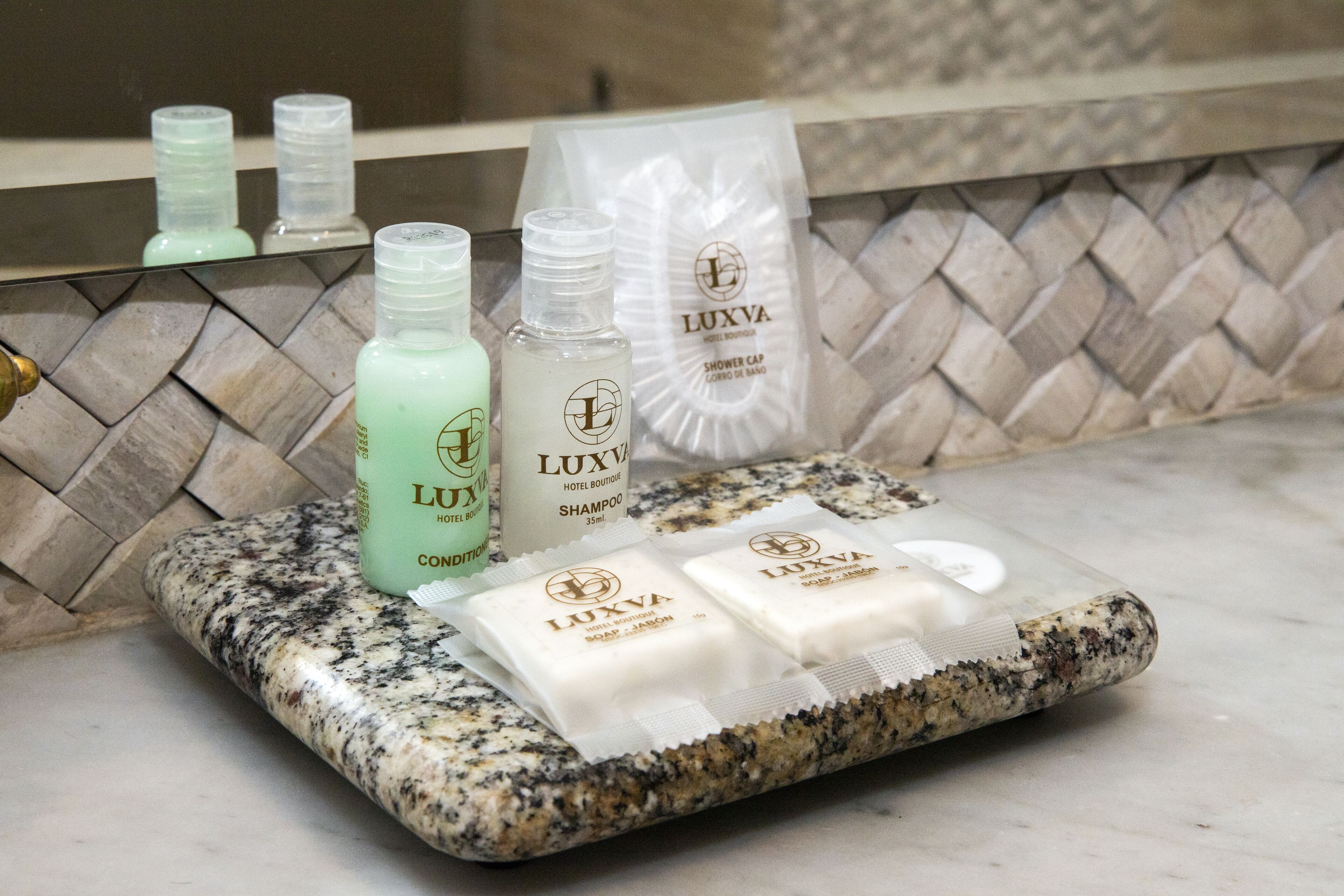 deluxe single room | bathroom | shower, rainfall showerhead, hair dryer, bidet