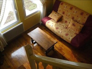 Quadruple Room (Louisiane) | Living room | Flat-screen TV