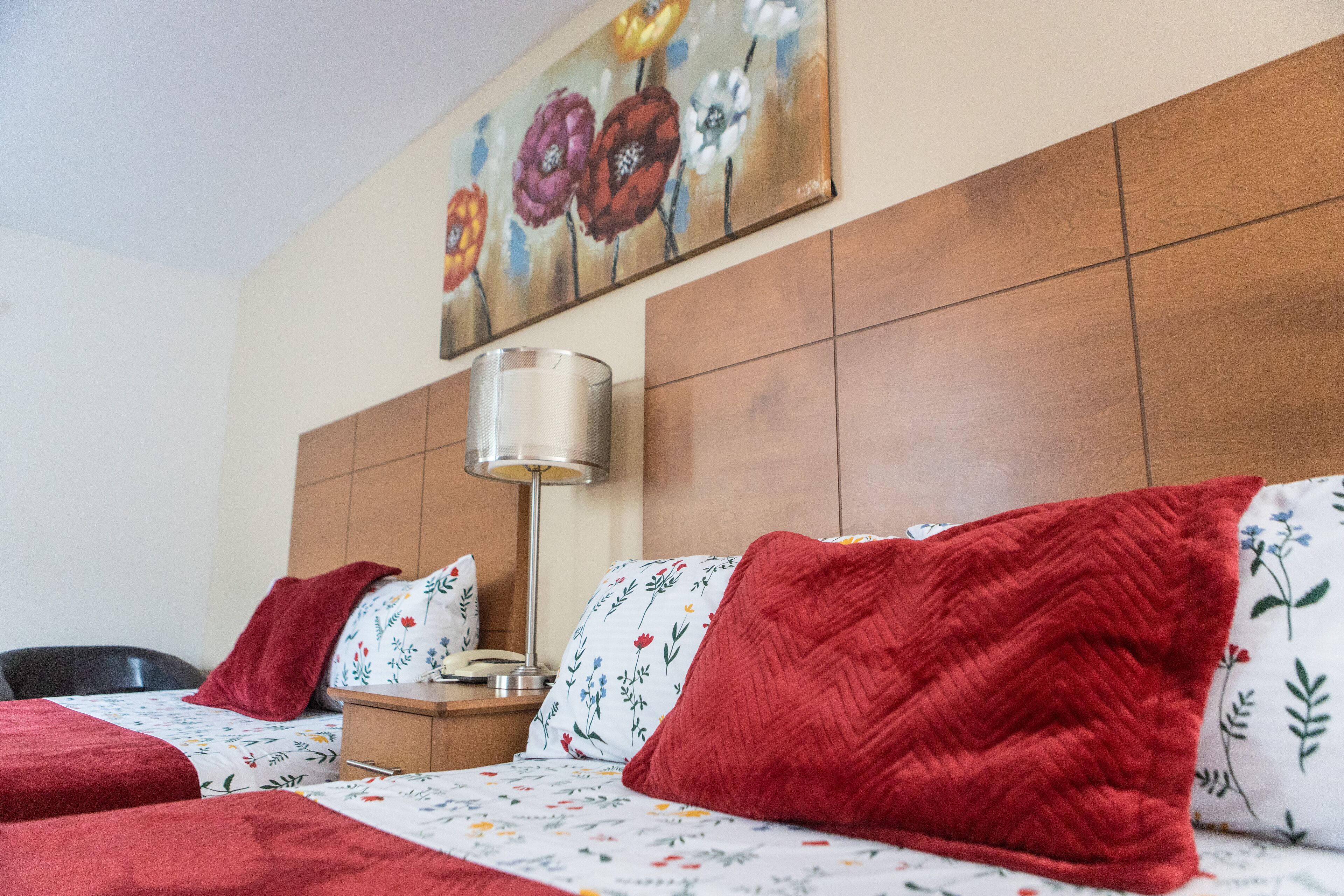 Chambre quadruple Confort | Literie de qualité, lit avec matelas en mousse à mémoire