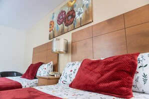Comfort Quadruple Room | Premium bedding, memory foam beds, individually furnished, desk