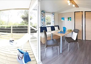 Basic Mobile Home, 1 Bedroom | Living area | 40-cm flat-screen TV with digital channels, TV, table tennis - Camping Haliotis (Pontorson)