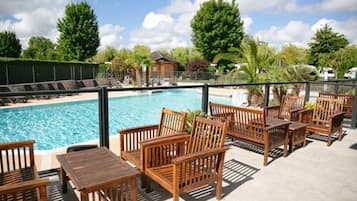 Seasonal outdoor pool, open 10:00 AM to 7:30 PM, sun loungers