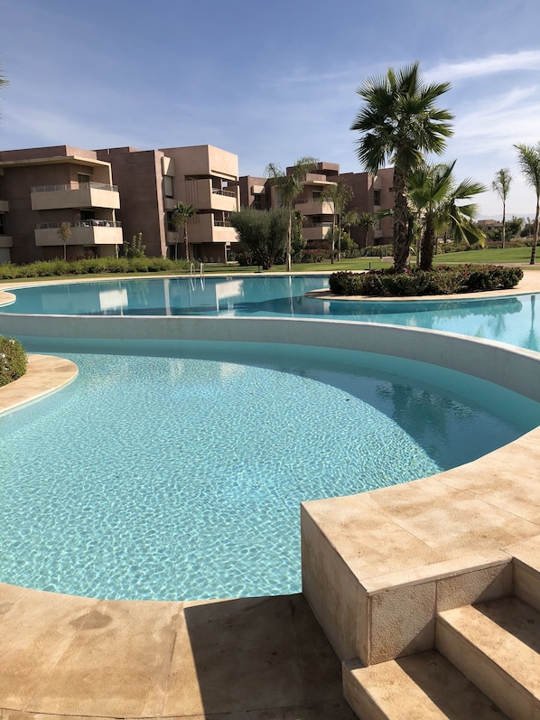 3 outdoor pools, pool umbrellas, sun loungers
