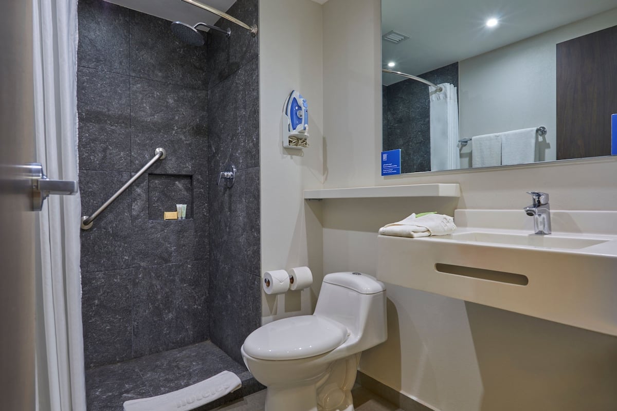 shower, towels, soap, shampoo