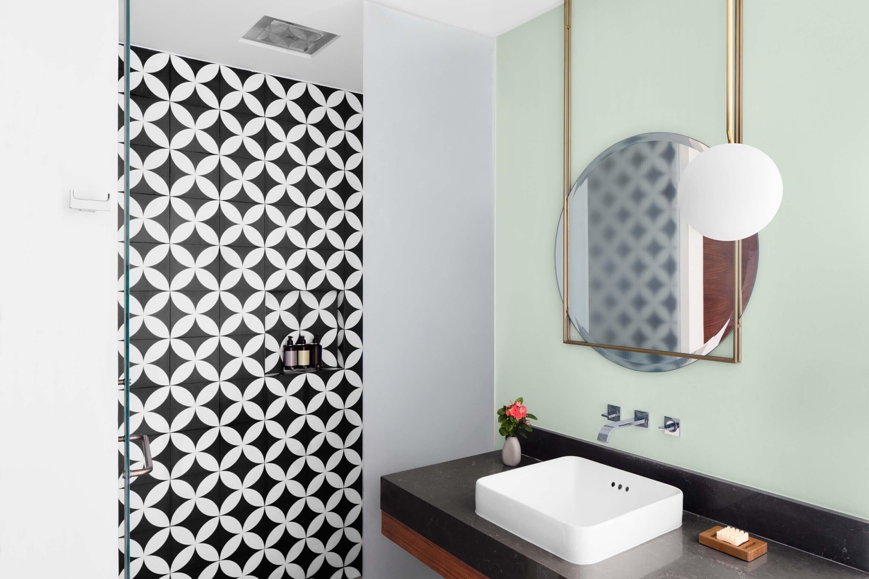 shower, rainfall showerhead, hair dryer, towels