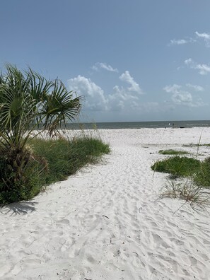 On the beach, sun-loungers, beach towels
