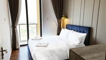 Suite, 2 Bedrooms | 1 bedroom, desk, laptop workspace, free WiFi