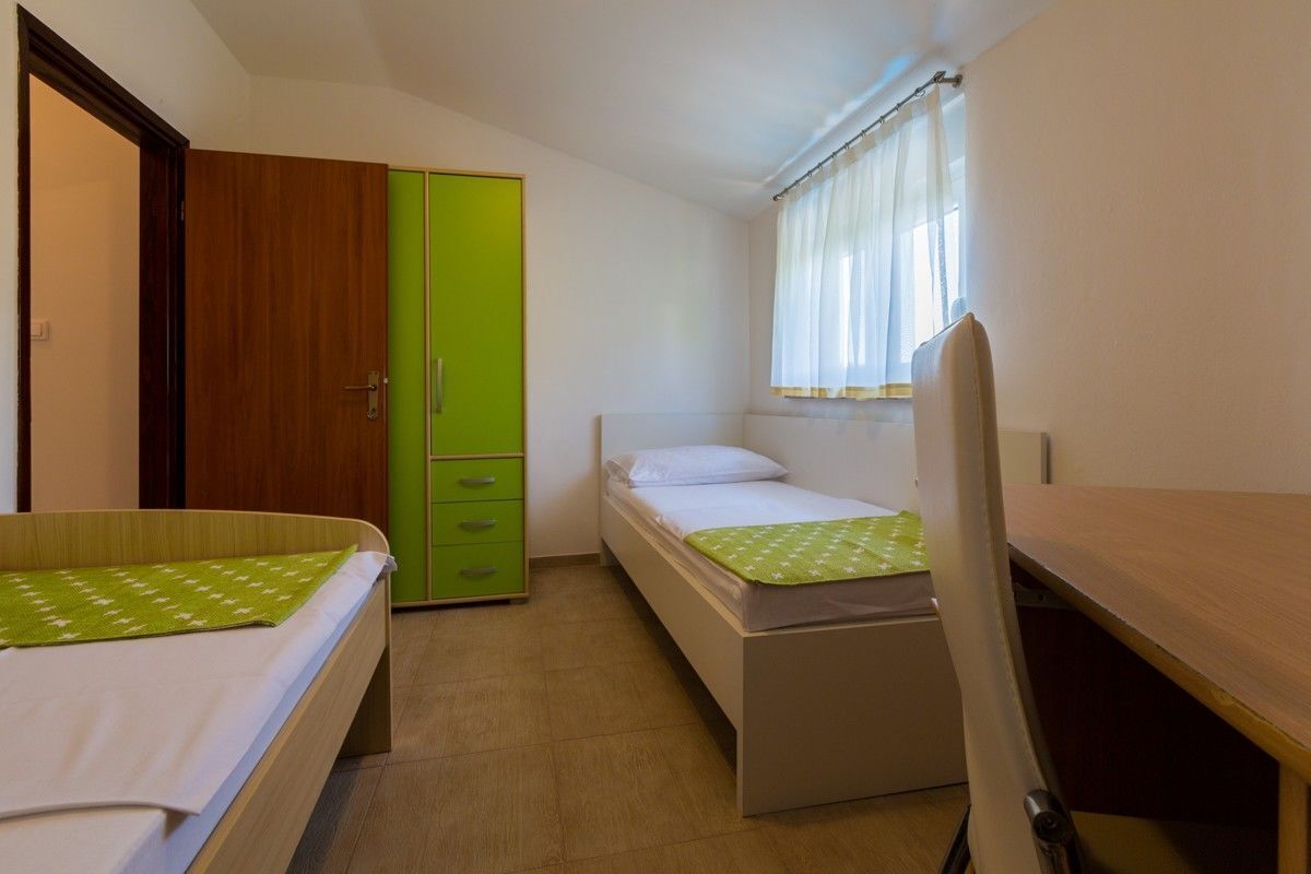 1 chambre, fer et planche à repasser, accès au Wi-Fi (inclus)
