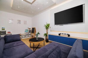 Appartement (A1) | Salle de séjour | Téléviseur