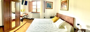 Quarto casal ou duplo | Cortinas blackout, Wi-Fi de cortesia, roupa de cama