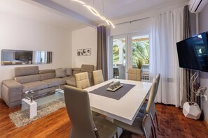 Appartement (A1) | Salle de séjour | Téléviseur