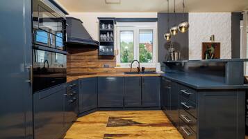 Apartment (A5) | Private kitchen | Espresso maker, fridge, microwave, stovetop
