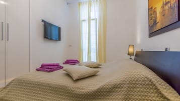 1 chambre, coffres-forts dans les chambres, fer et planche à repasser