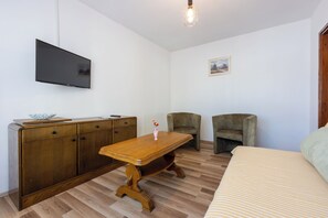 Departamento (A1) | Sala de estar | Televisión 