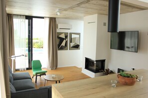 Living room | Fireplace, video game console - Villa Sunny Garden (Rab)