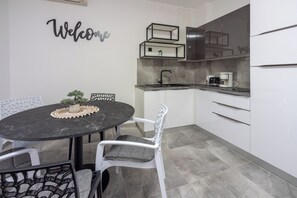 Apartment (A2) | Private kitchen | Fridge, stovetop, dishwasher, espresso maker - Apartments Plemmy (Crikvenica)