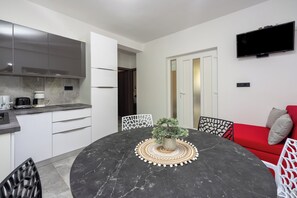 Apartment (A2) | Private kitchen | Fridge, stovetop, espresso maker, electric kettle - Apartments Plemmy (Crikvenica)