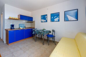 Private kitchen | Fridge, stovetop, espresso maker, electric kettle - Apartments Loncaric (Crikvenica)