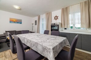 Apartment (A1) | Private kitchen | Fridge, microwave, oven, stovetop - Apartments Tajci (Crikvenica)