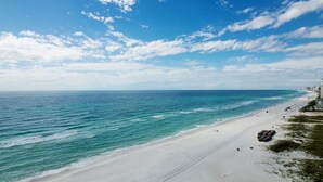 A beach with clear blue water and a sandy shore. - 11th floor paradise! (Panama City Beach)